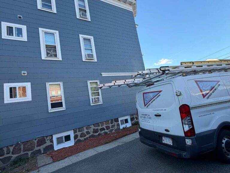 Reyes Services van at an exterior painting job